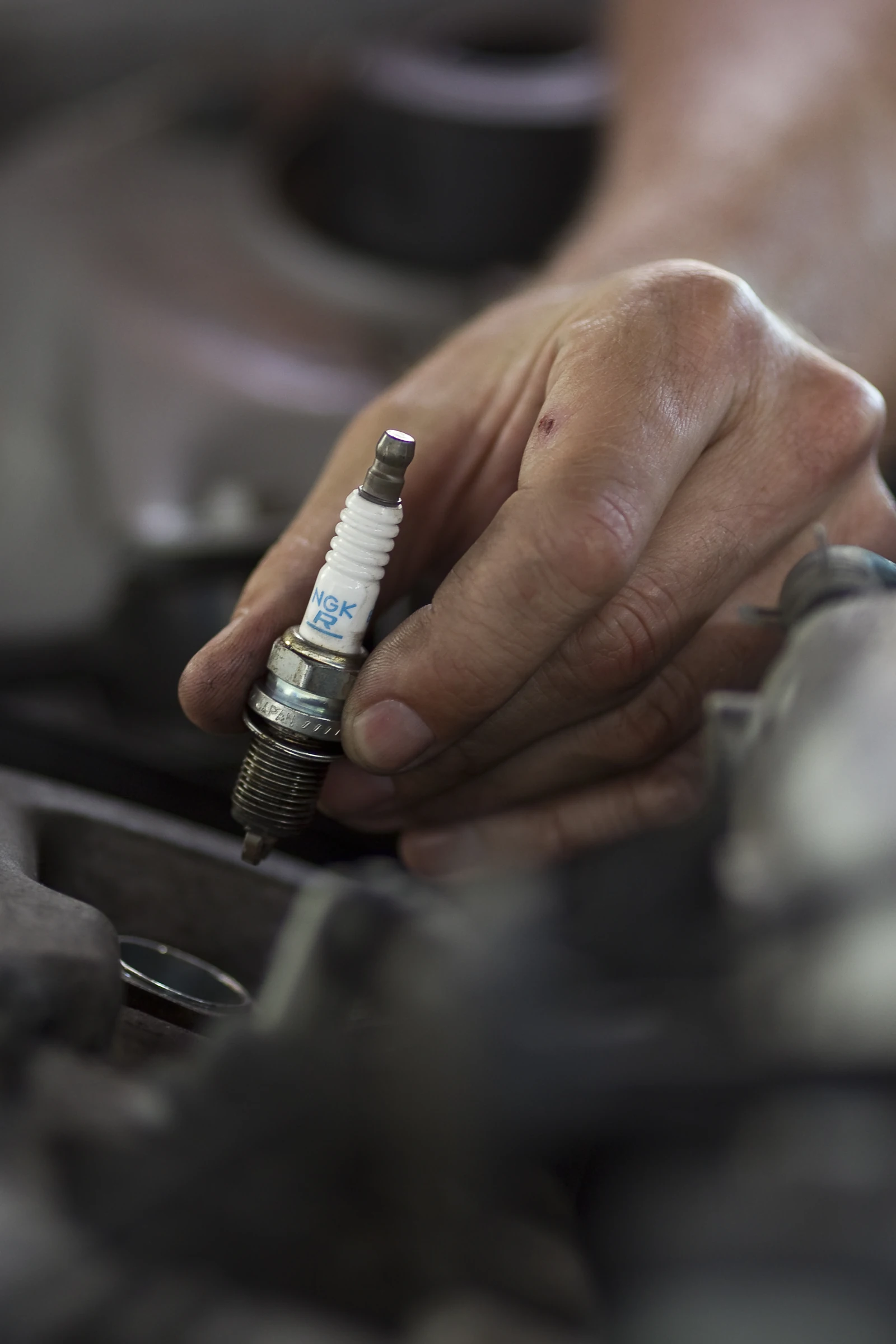 Spark plug and workshop tools